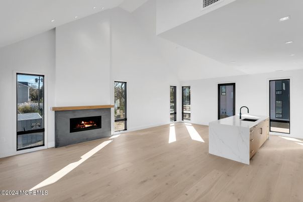 Empty room, Fireplace, Interior, Kitchen, Recessed Lighting, Wood Texture Flooring