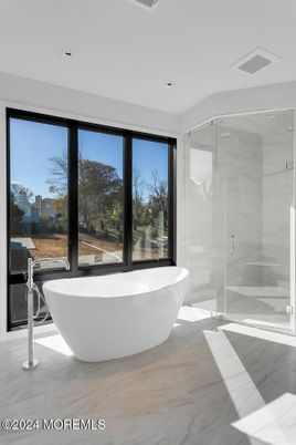 Bathroom, Free Standing Baths, Glass Shower, Interior, Marble, Marble Walls, Recessed Lighting
