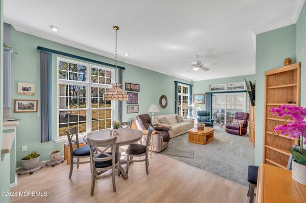 Dining room, Fireplace, Interior, Living room, Pendant Lights, Recessed Lighting, Wood Texture Flooring