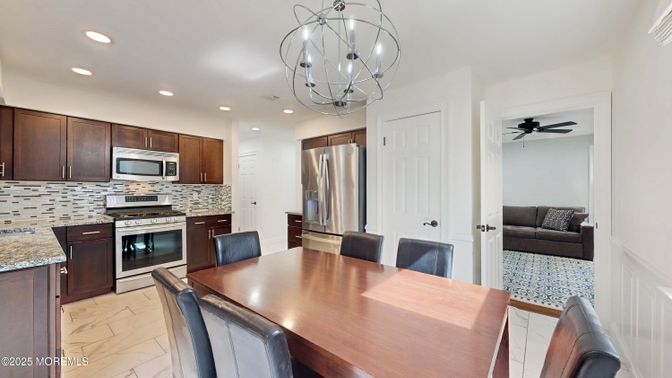 Chandelier, Dining room, Interior, Kitchen, Marble, Recessed Lighting, Stainless Steel Appliances