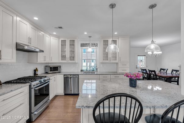 Dining room, Interior, Kitchen, Pendant Lights, Recessed Lighting, Stainless Steel Appliances, Wood Texture Flooring
