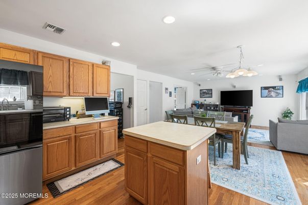 Dining room, Interior, Kitchen, Living room, Pendant Lights, Recessed Lighting, Wood Texture Flooring