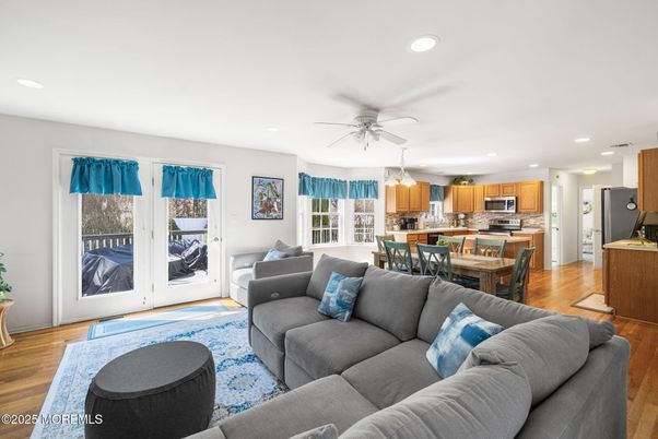 Dining room, Interior, Kitchen, Living room, Recessed Lighting, Stainless Steel Appliances, Wood Texture Flooring