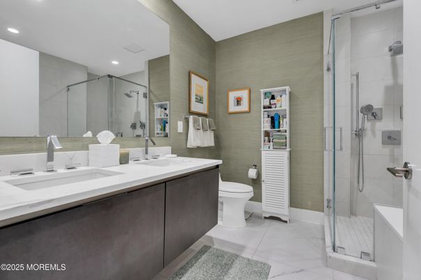 Bathroom, Dual Sink Vanities, Glass Shower, Interior, Marble, Marble Walls, Recessed Lighting