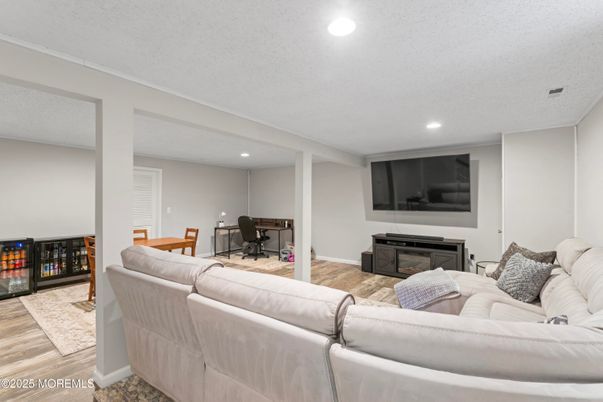 Fireplace, Interior, Living room, Recessed Lighting, Wood Texture Flooring