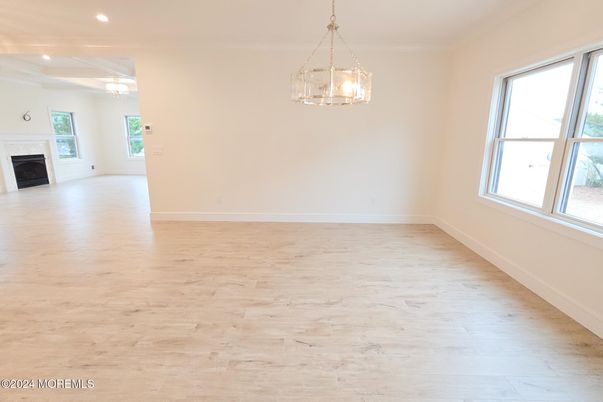 Empty room, Fireplace, Interior, Pendant Lights, Recessed Lighting, Wood Texture Flooring