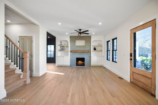 Empty room, Fireplace, Interior, Recessed Lighting, Wood Texture Flooring