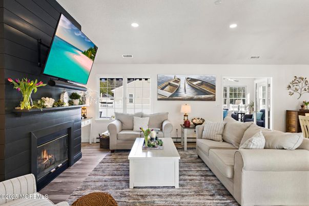 Fireplace, Interior, Living room, Recessed Lighting, Wood Texture Flooring
