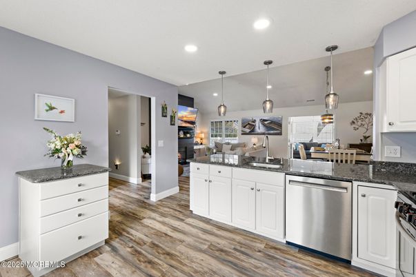 Dining room, Interior, Kitchen, Pendant Lights, Recessed Lighting, Stainless Steel Appliances, Wood Texture Flooring