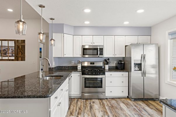 Interior, Kitchen, Pendant Lights, Recessed Lighting, Stainless Steel Appliances, Wood Texture Flooring