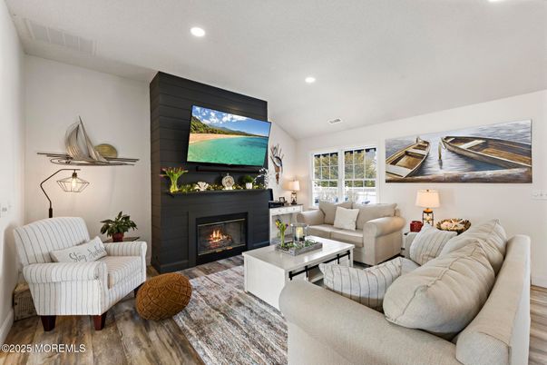 Fireplace, Interior, Living room, Recessed Lighting, Wood Texture Flooring