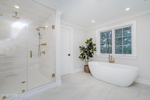 Bathroom, Free Standing Baths, Glass Shower, Interior, Marble, Marble Walls, Recessed Lighting