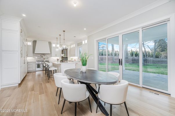 Dining room, Interior, Kitchen, Marble Walls, Pendant Lights, Recessed Lighting, Wood Texture Flooring