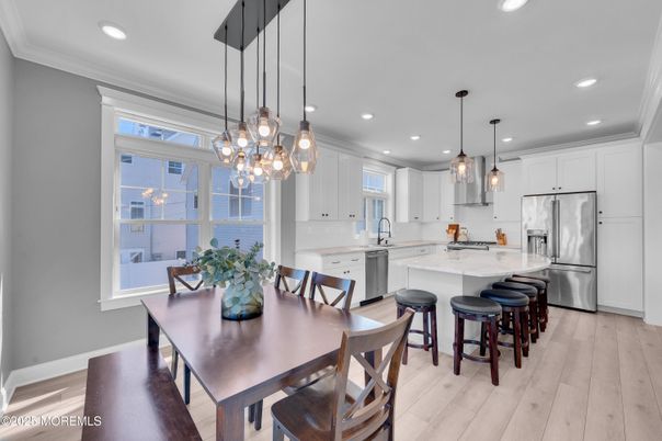 Dining room, Interior, Kitchen, Pendant Lights, Recessed Lighting, Stainless Steel Appliances, Wood Texture Flooring