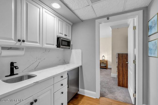 Interior, Kitchen, Marble Walls, Recessed Lighting, Wood Texture Flooring