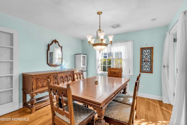 Chandelier, Dining room, Interior, Wood Texture Flooring