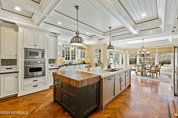 Chandelier, Dining room, Interior, Kitchen, Pendant Lights, Recessed Lighting, Stainless Steel Appliances, Wood Texture Flooring