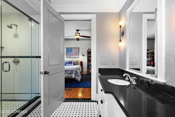 Bathroom, Bedroom, Dual Sink Vanities, Glass Shower, Interior, Wood Texture Flooring