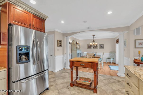Chandelier, Dining room, Interior, Kitchen, Recessed Lighting, Stainless Steel Appliances, Wood Texture Flooring