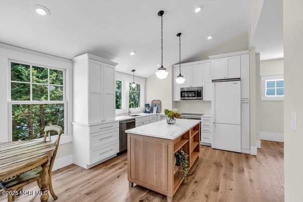 Interior, Kitchen, Pendant Lights, Recessed Lighting, Stainless Steel Appliances, Wood Texture Flooring