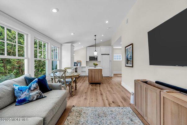 Dining room, Interior, Kitchen, Living room, Pendant Lights, Recessed Lighting, Stainless Steel Appliances, Wood Texture Flooring