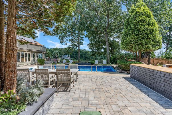 Exterior, Pool, Solar Panels