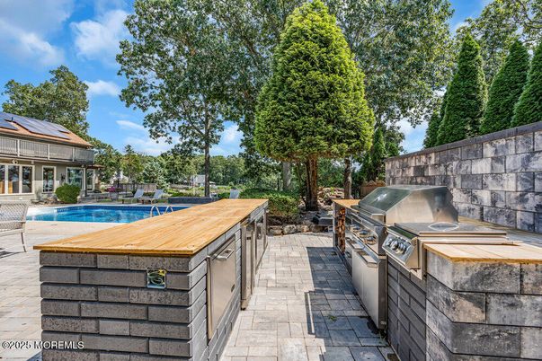 Exterior, Pool, Solar Panels