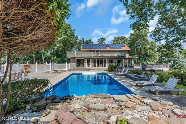 Exterior, Pool, Solar Panels