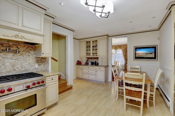 Dining room, Interior, Kitchen, Recessed Lighting, Stainless Steel Appliances, Wood Texture Flooring
