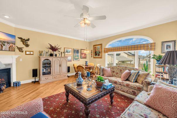Dining room, Fireplace, Interior, Living room, Pendant Lights, Recessed Lighting, Wood Texture Flooring