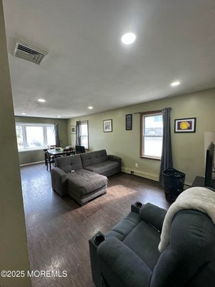 Dining room, Fireplace, Interior, Living room, Recessed Lighting, Wood Texture Flooring