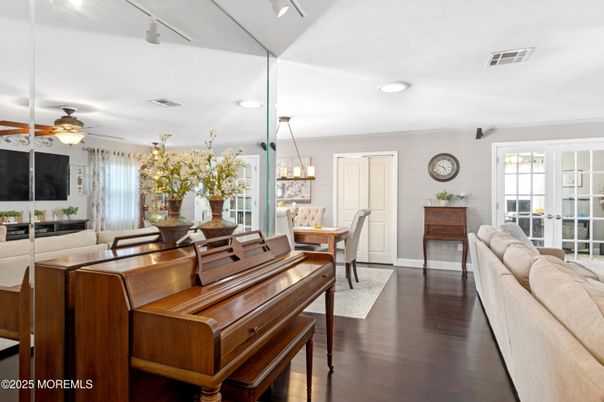 Chandelier, Dining room, Interior, Living room, Piano, Recessed Lighting, Wood Texture Flooring