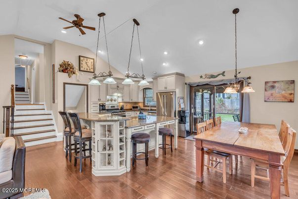 Dining room, Interior, Kitchen, Pendant Lights, Recessed Lighting, Stainless Steel Appliances, Wood Texture Flooring