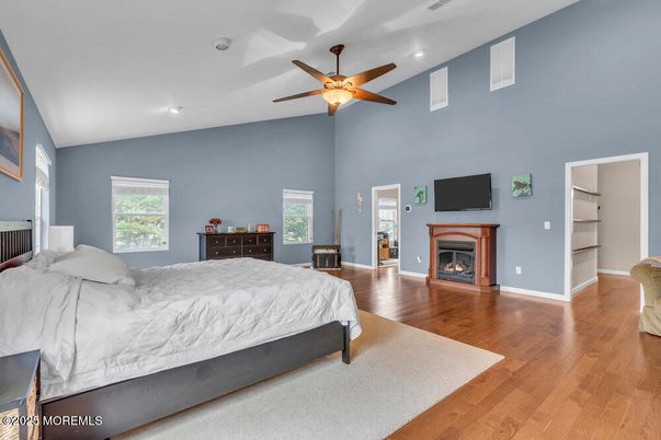 Bedroom, Fireplace, Interior, Recessed Lighting, Wood Texture Flooring