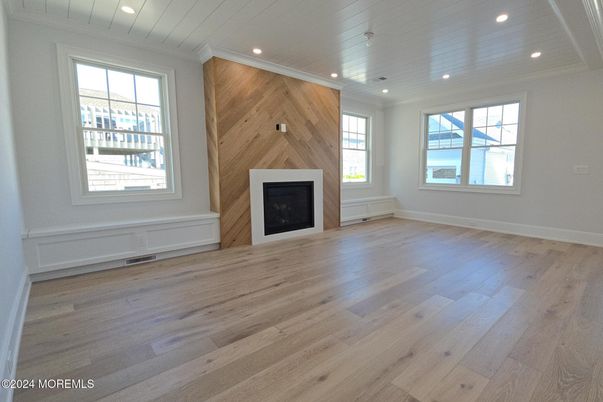 Empty room, Fireplace, Interior, Recessed Lighting, Wood Texture Flooring, Wooden Walls