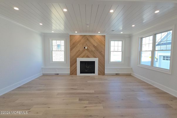 Empty room, Fireplace, Interior, Recessed Lighting, Wood Texture Flooring, Wooden Walls