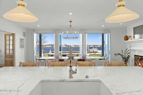 Dining room, Fireplace, Interior, Pendant Lights, Recessed Lighting, Water