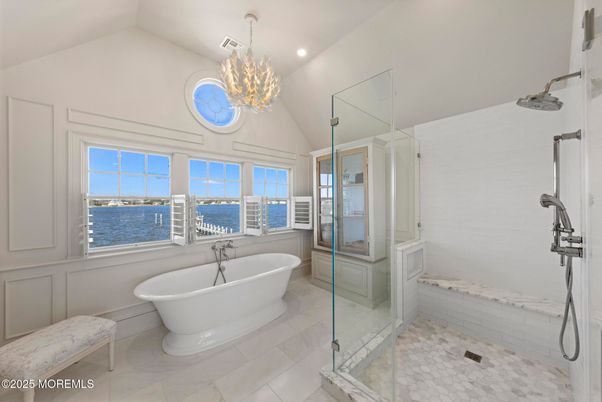 Bathroom, Chandelier, Free Standing Baths, Glass Shower, Interior, Recessed Lighting, Water