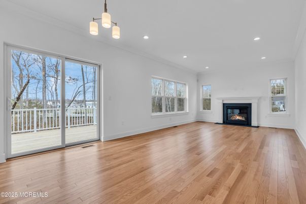 Empty room, Fireplace, Interior, Pendant Lights, Recessed Lighting, Wood Texture Flooring