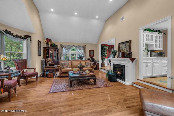 Fireplace, Interior, Living room, Recessed Lighting, Wood Texture Flooring