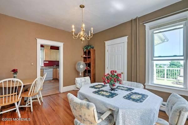 Chandelier, Dining room, Interior, Wood Texture Flooring