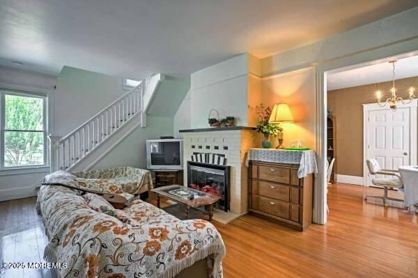Chandelier, Fireplace, Interior, Living room, Wood Texture Flooring