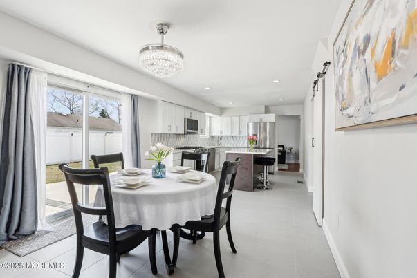 Chandelier, Dining room, Interior, Kitchen, Recessed Lighting, Stainless Steel Appliances