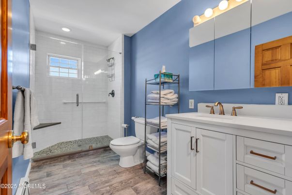Bathroom, Glass Shower, Interior, Recessed Lighting, Wood Texture Flooring