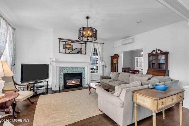 Dining room, Fireplace, Interior, Living room, Pendant Lights, Wood Texture Flooring
