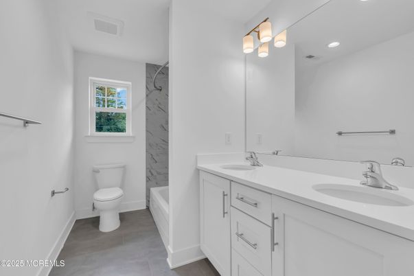 Bathroom, Dual Sink Vanities, Interior, Marble Walls, Recessed Lighting