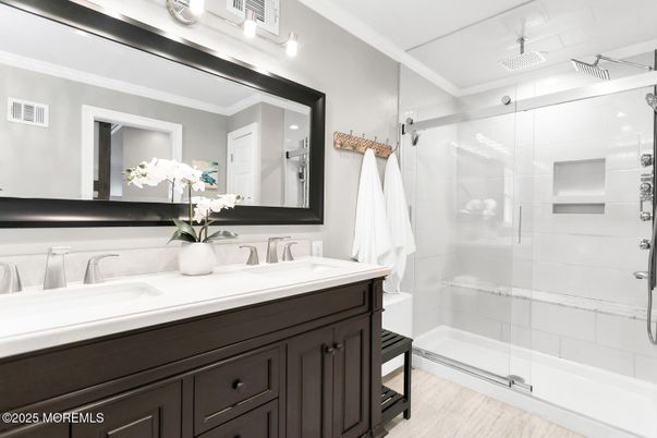 Bathroom, Dual Sink Vanities, Glass Shower, Interior, Wood Texture Flooring