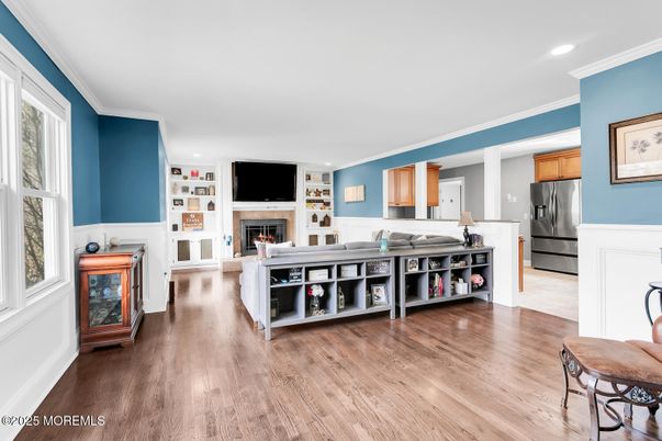 Fireplace, Interior, Kitchen, Recessed Lighting, Stainless Steel Appliances, Wood Texture Flooring