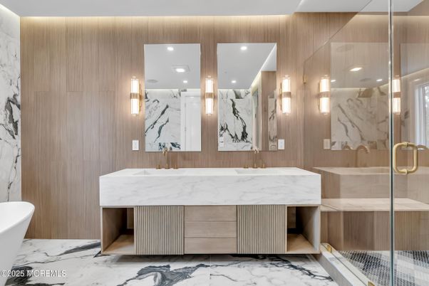 Bathroom, Dual Sink Vanities, Glass Shower, Interior, Marble, Marble Walls, Recessed Lighting