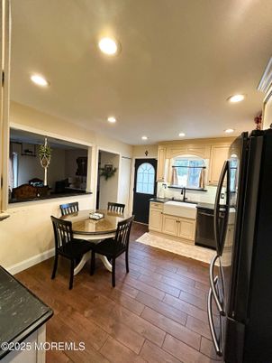 Dining room, Interior, Kitchen, Recessed Lighting, Stainless Steel Appliances, Wood Texture Flooring